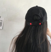 Gorra snapback con lazo en la espalda